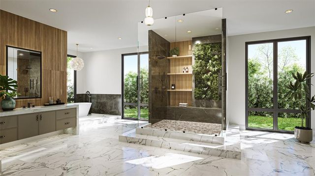 a large bathroom with a large tub and shower