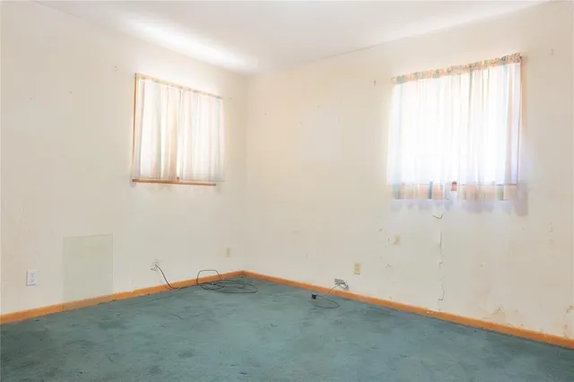 an empty room with a window