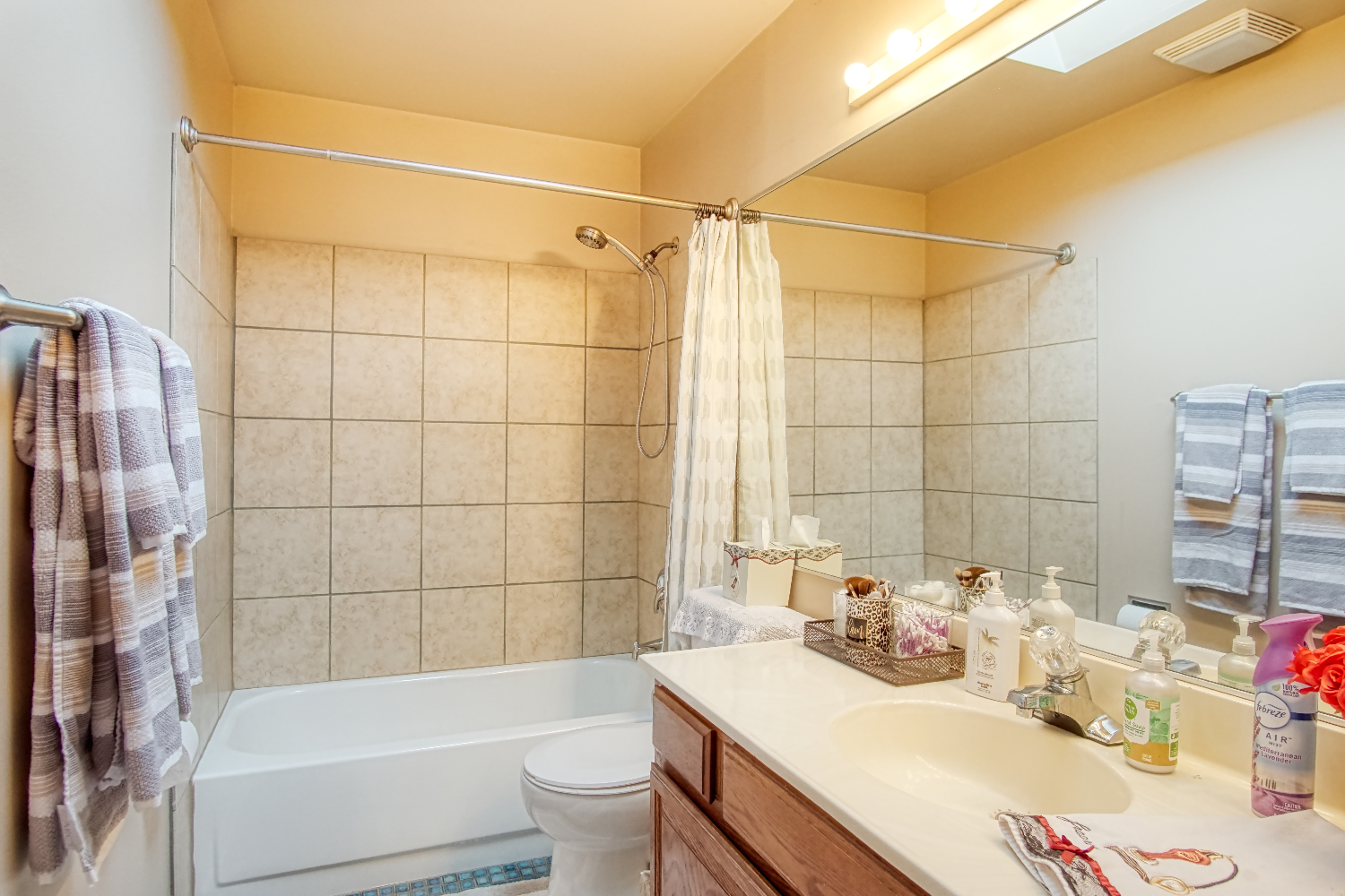 27W210 Churchill Road Winfield, IL 60190 - Photo 14 of 21 a bathroom with a sink toilet tub and shower