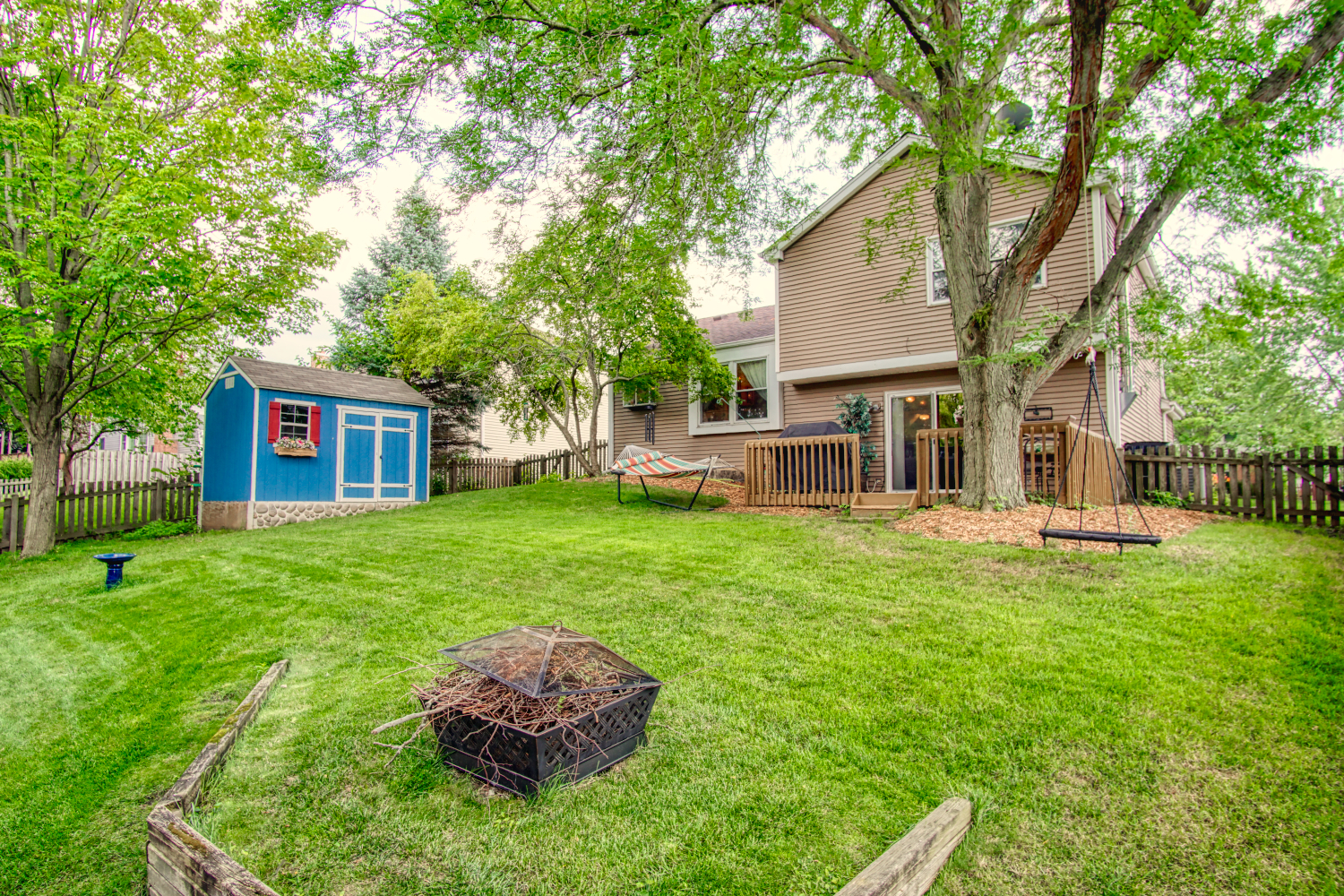 27W210 Churchill Road Winfield, IL 60190 - Photo 17 of 21 a house view with a sitting space and garden