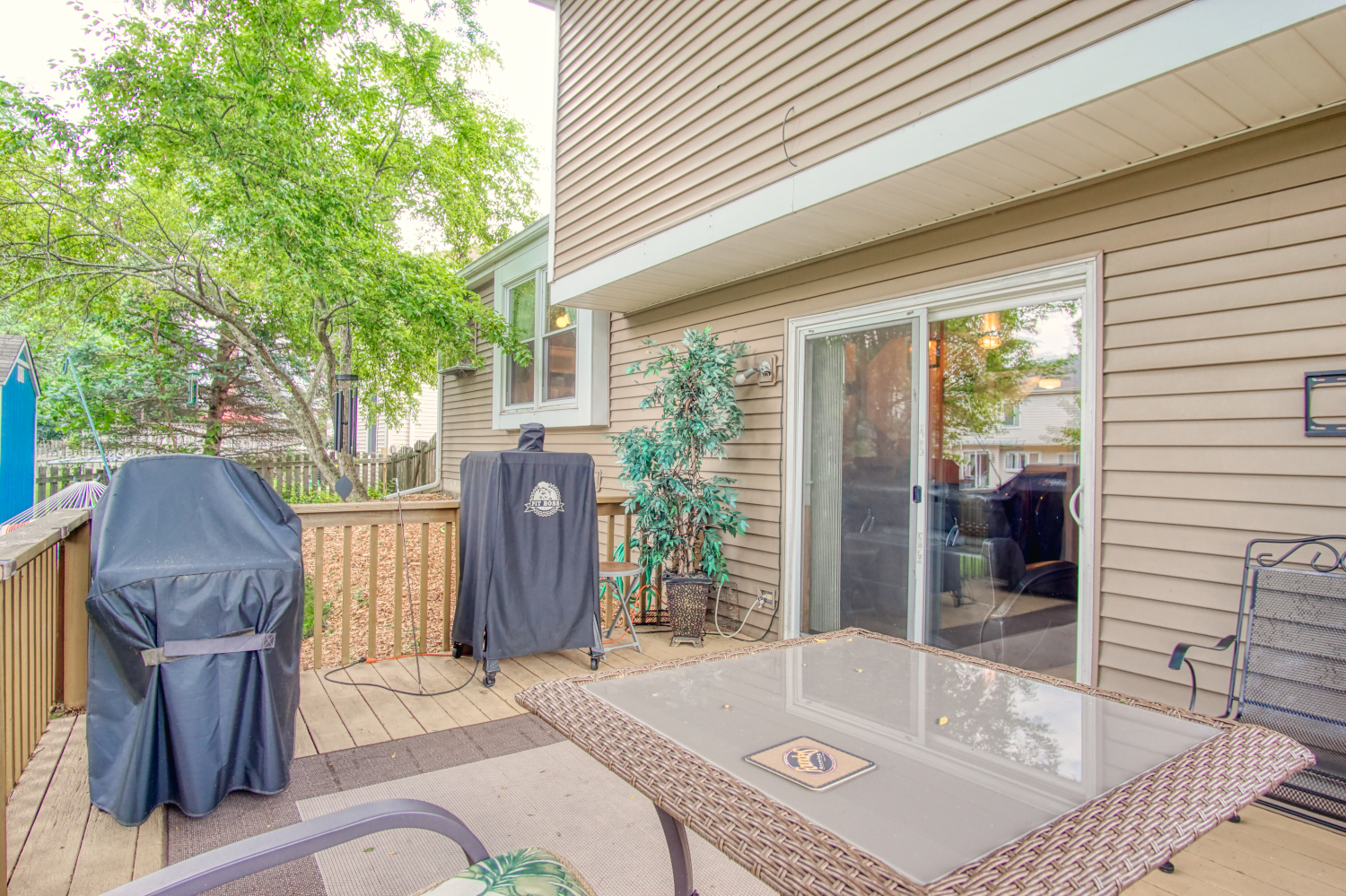 27W210 Churchill Road Winfield, IL 60190 - Photo 19 of 21 a view of backyard with tub and outdoor seating