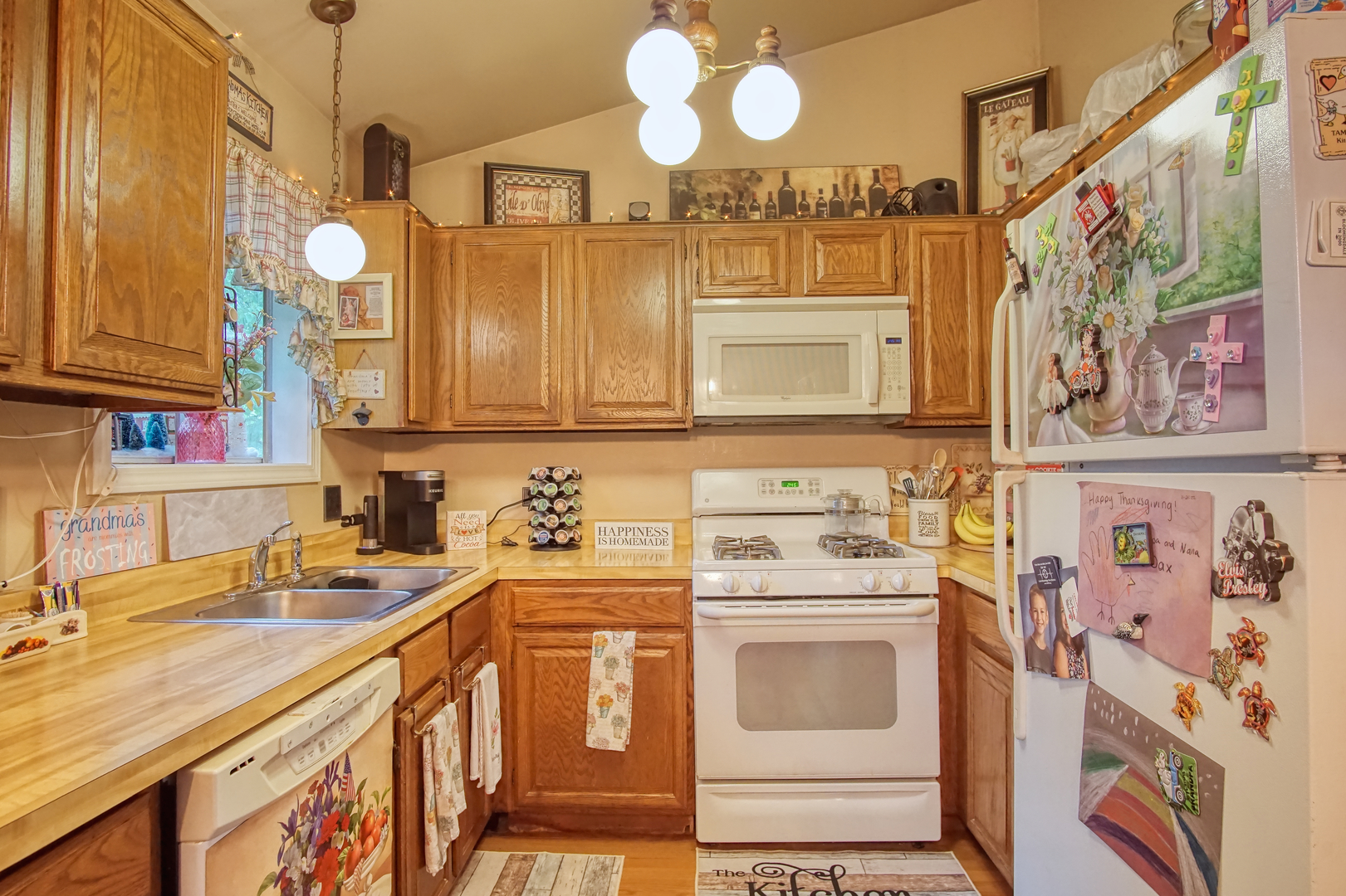 27W210 Churchill Road Winfield, IL 60190 - Photo 6 of 21 a kitchen with a sink cabinets and window