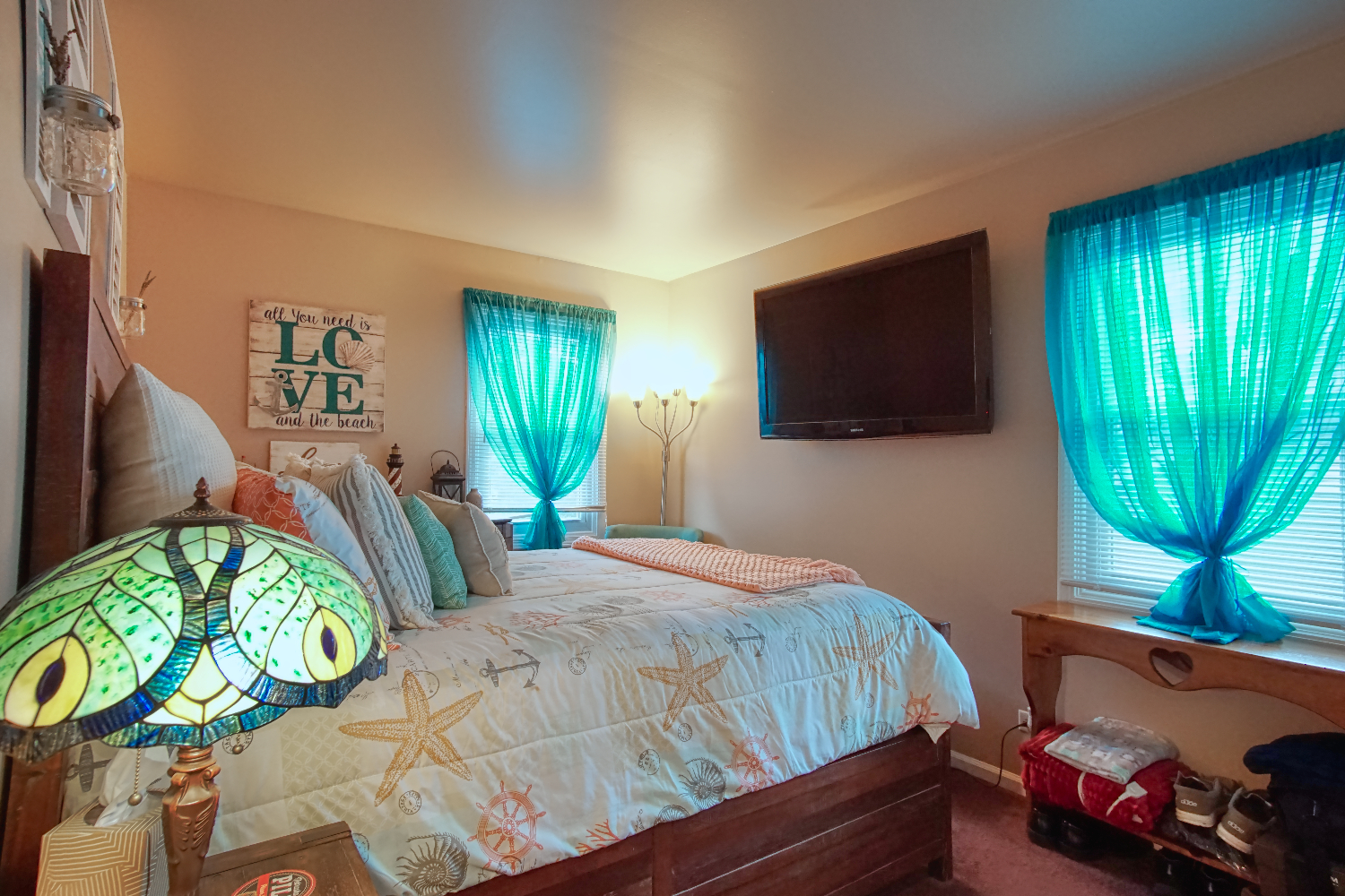 27W210 Churchill Road Winfield, IL 60190 - Photo 10 of 21 a bedroom with a bed window television and a window