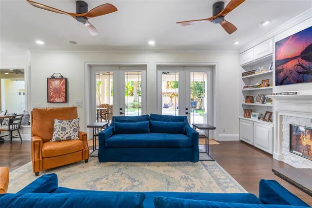 a bedroom with two beds and a couch