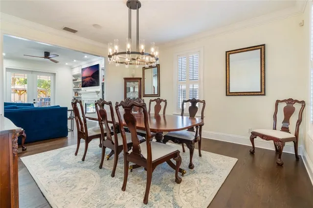 a bath tub sitting in a bathroom next to a window