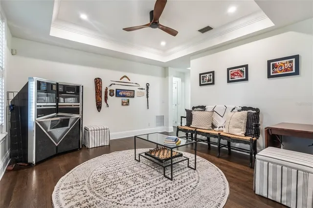 a view of a chairs and tables in the balcony