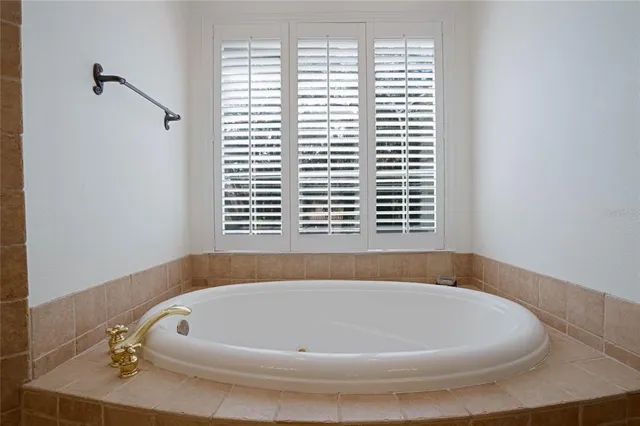 a view of staircase with wooden floor and a rug