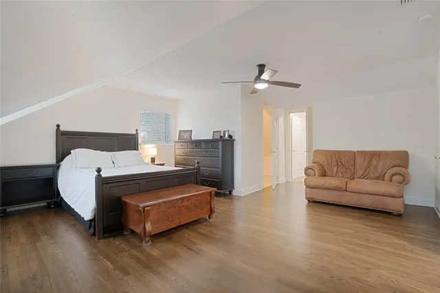 a bathroom with a sink toilet and a mirror