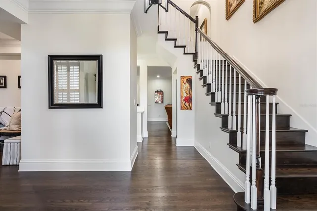 an aerial view of a city with lots of residential buildings lake and ocean view