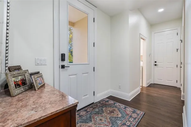 a house view with a sitting space and garden