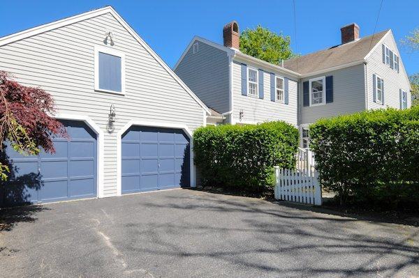 4084 Main Street Barnstable, MA 02675 - Photo 12 of 15 a view of a house with a yard and garage