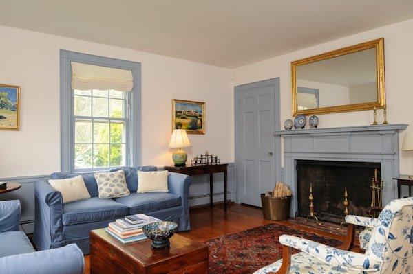 4084 Main Street Barnstable, MA 02675 - Photo 3 of 15 a living room with furniture and a fireplace