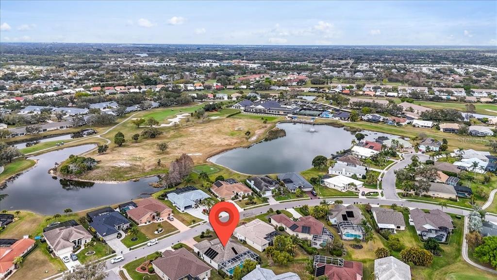 6710 Pleasant Hill Road Bradenton, FL 34203 - Photo 14 of 72 an aerial view of residential houses with outdoor space