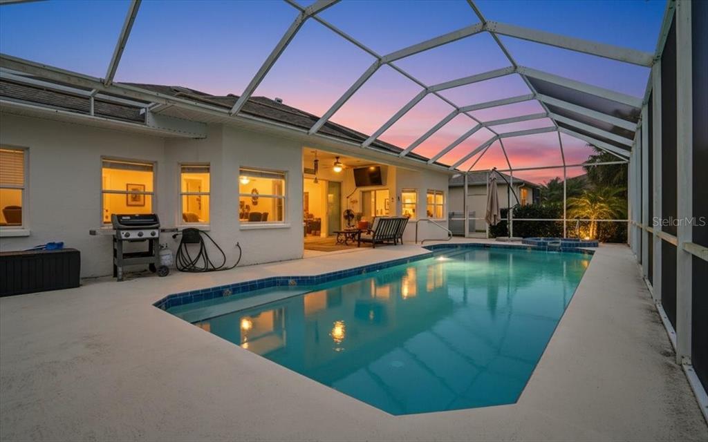 6710 Pleasant Hill Road Bradenton, FL 34203 - Photo 18 of 72 a view of a swimming pool with a outdoor seating