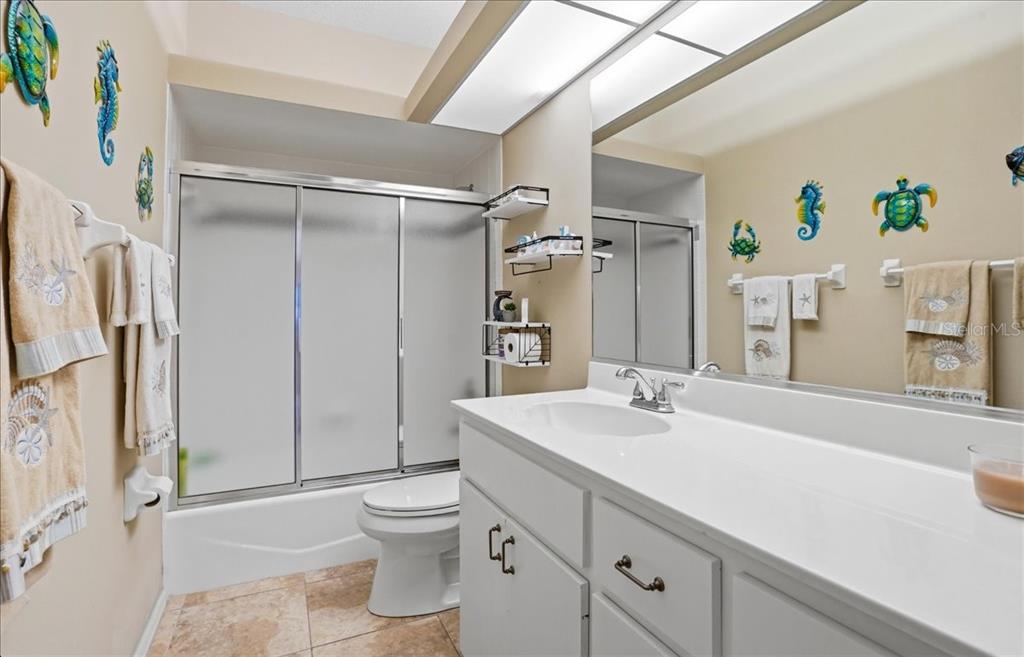 6710 Pleasant Hill Road Bradenton, FL 34203 - Photo 47 of 72 a bathroom with a sink a toilet and shower