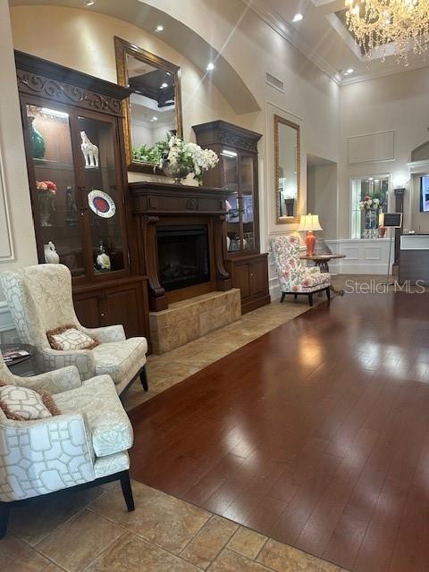 6710 Pleasant Hill Road Bradenton, FL 34203 - Photo 52 of 72 a living room with furniture and a fireplace