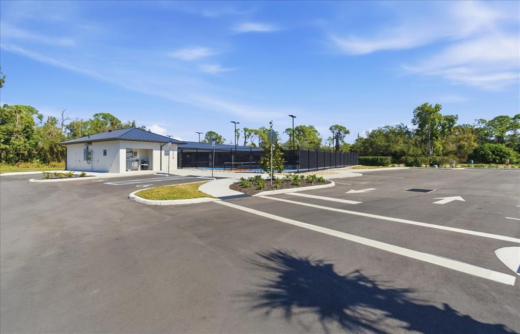6710 Pleasant Hill Road Bradenton, FL 34203 - Photo 59 of 72 a view of swimming pool with outdoor seating and house in the background