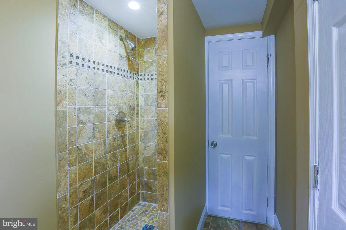 4740 Old Court Road Pikesville, MD 21208 - Photo 22 of 28 Shower in Lower level with dual entry.