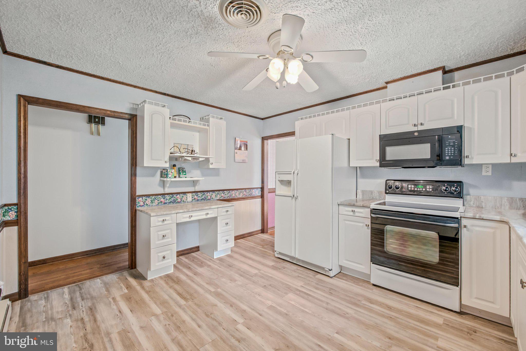 3203 Charles Town Road Kearneysville, WV 25430 - Photo 9 of 45 Spacious kitchen has been updated with LVP floors,