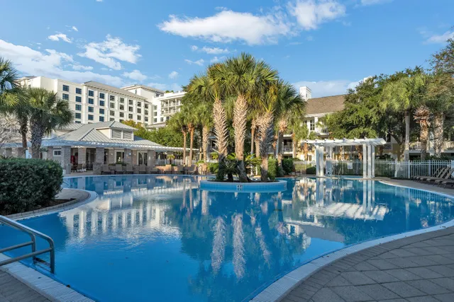 a view of a swimming pool with a patio