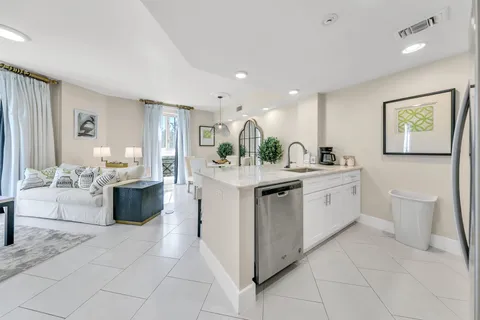 a kitchen with a sink and counter top space