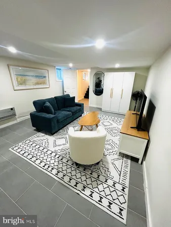 a living room with a couch and a table