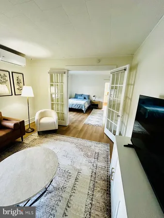 a bedroom with furniture and a couch