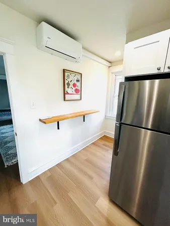 a view of a refrigerator in a kitchen