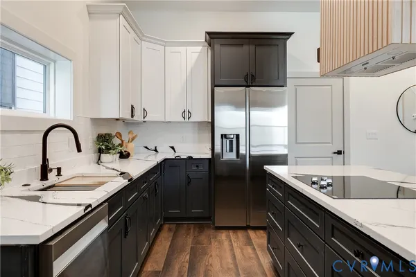 a kitchen with a sink a counter and cabinets