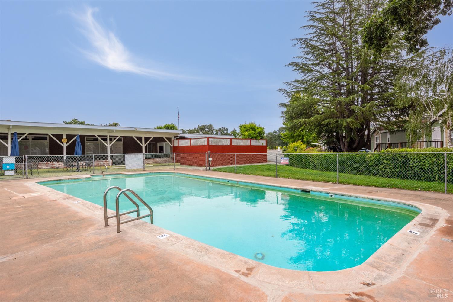 5754 Lois Avenue Santa Rosa, CA 95403 - Photo 21 of 23 a view of a swimming pool with a patio