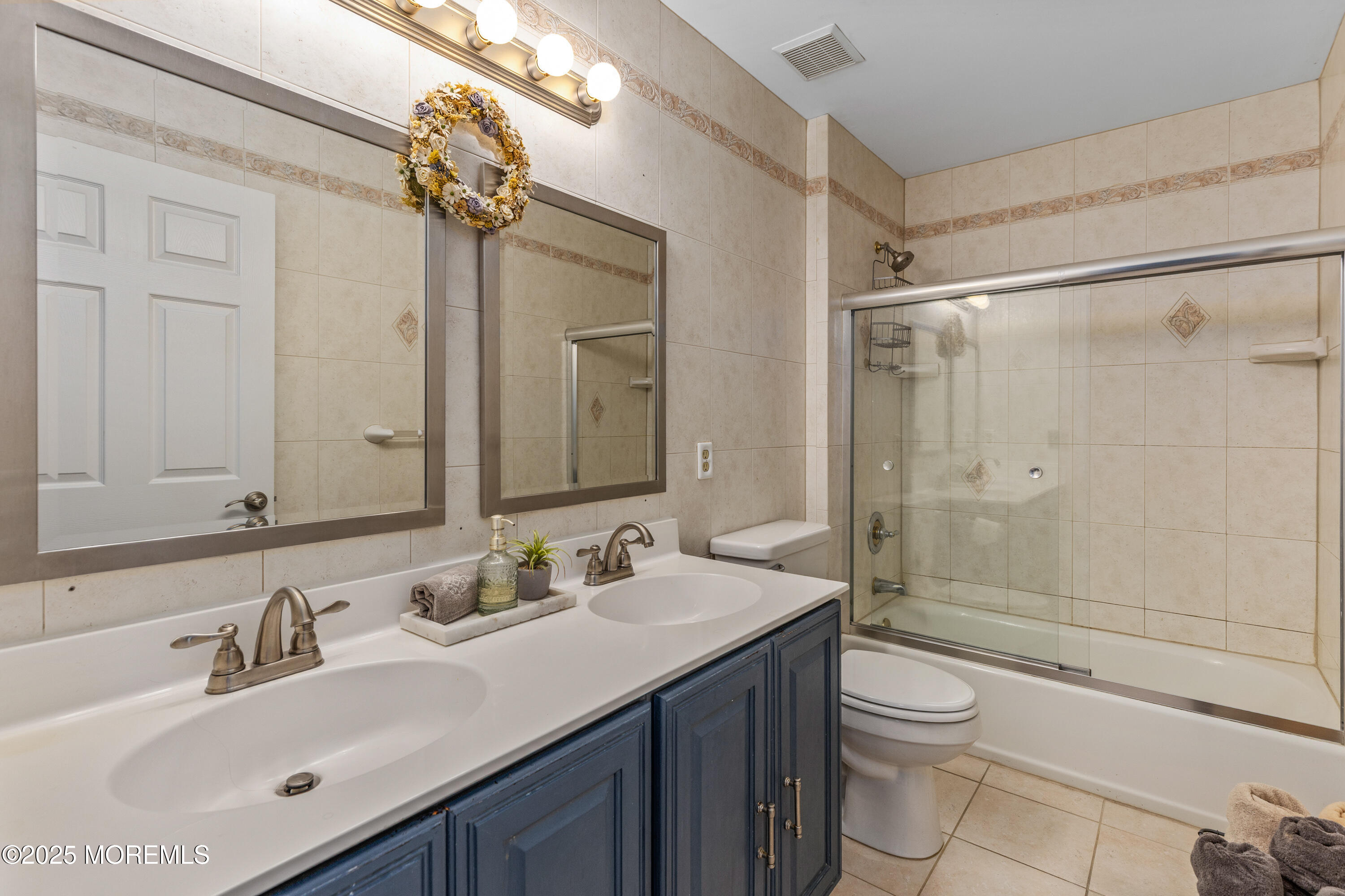 6 Diamond Lane Howell, NJ 07731 - Photo 30 of 78 a bathroom with a sink a toilet and shower