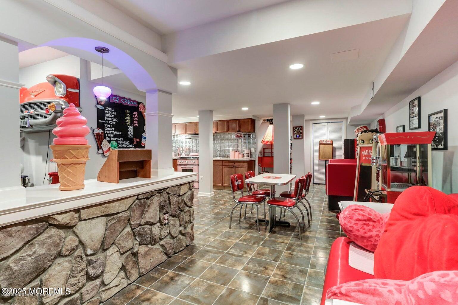 6 Diamond Lane Howell, NJ 07731 - Photo 40 of 78 a living room filled with furniture and a flat screen tv