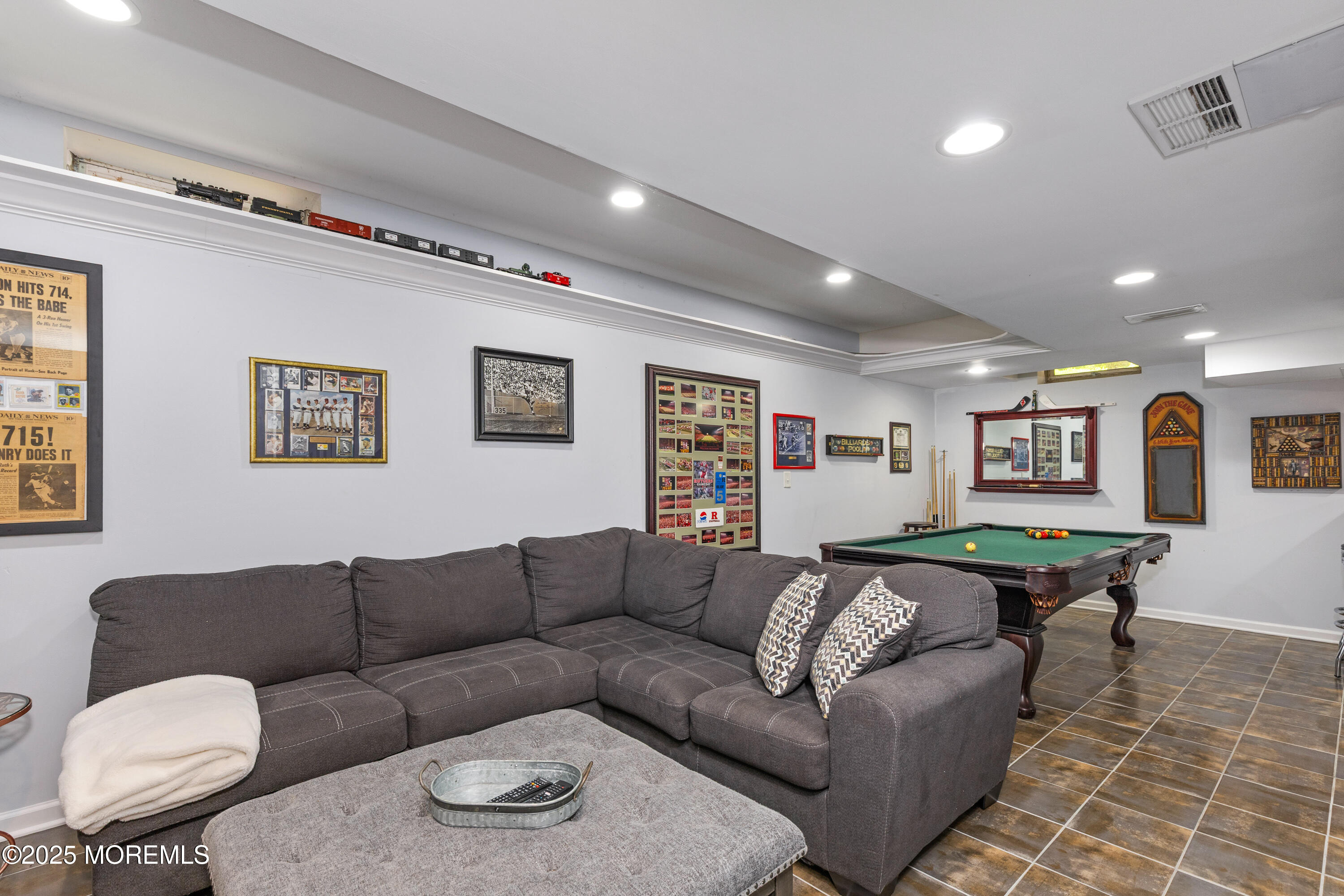 6 Diamond Lane Howell, NJ 07731 - Photo 43 of 78 a living room with furniture and a table