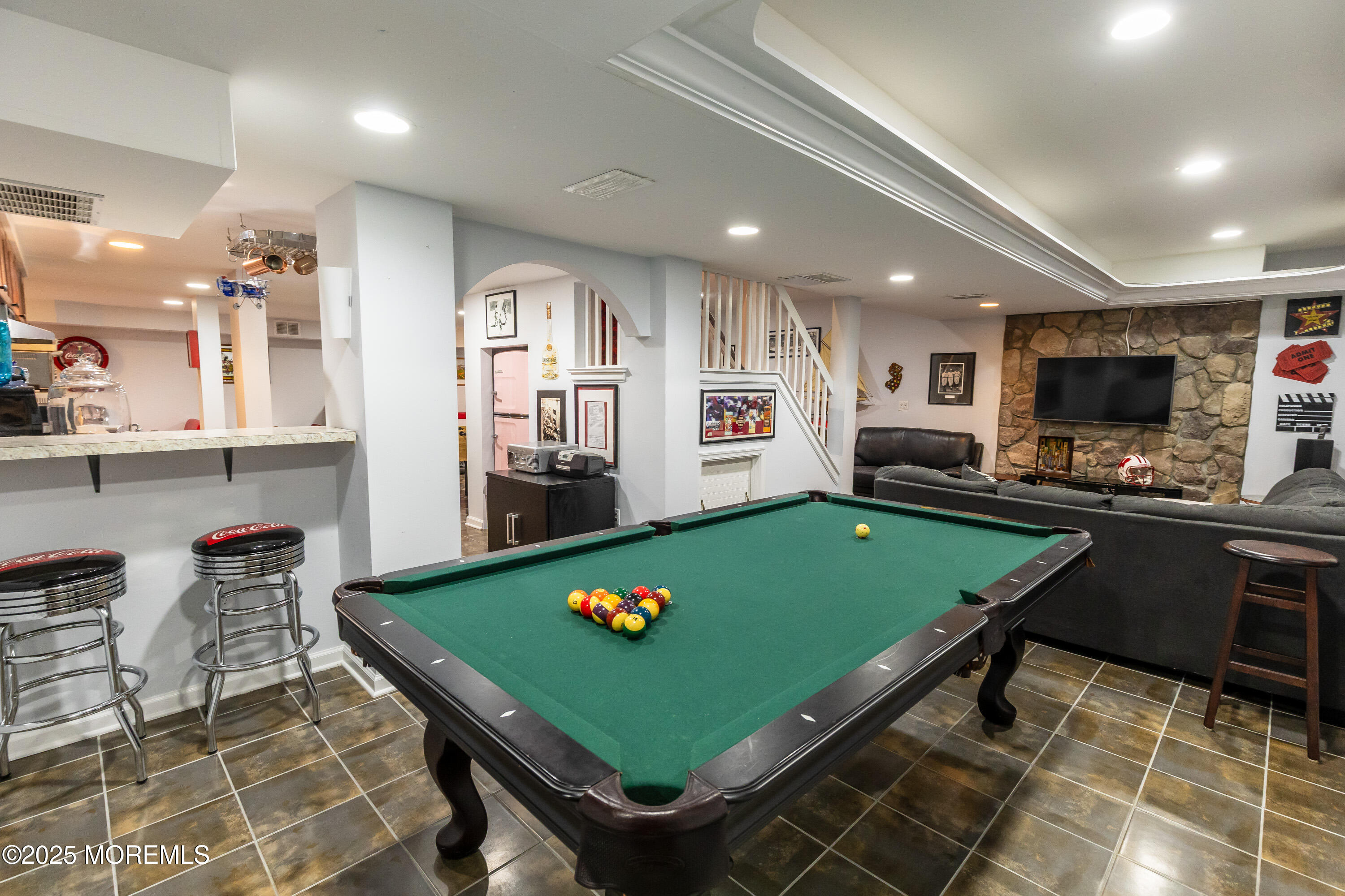 6 Diamond Lane Howell, NJ 07731 - Photo 47 of 78 a room with pool table and flat screen tv