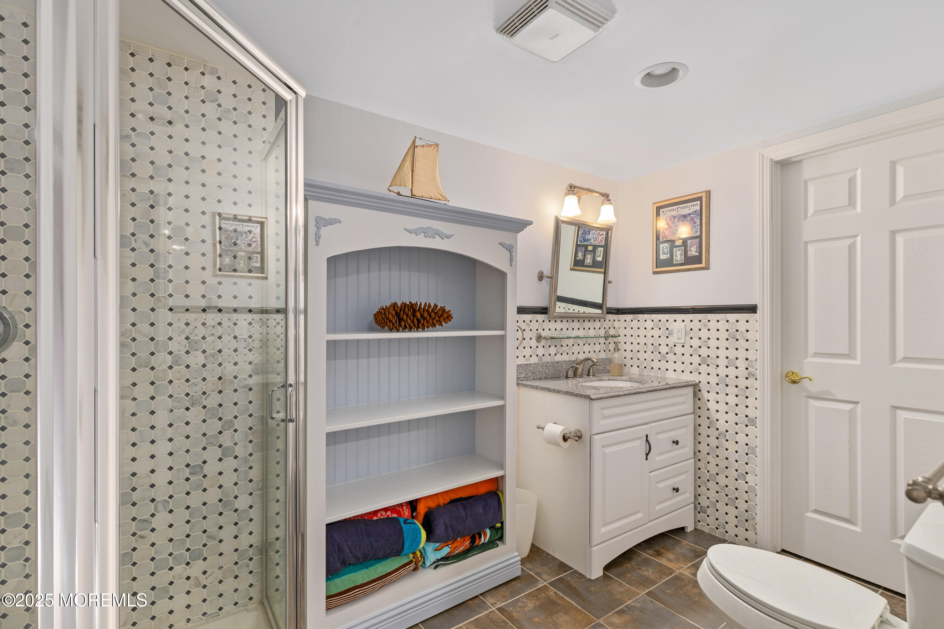 6 Diamond Lane Howell, NJ 07731 - Photo 51 of 78 a bathroom with a sink a toilet and shower