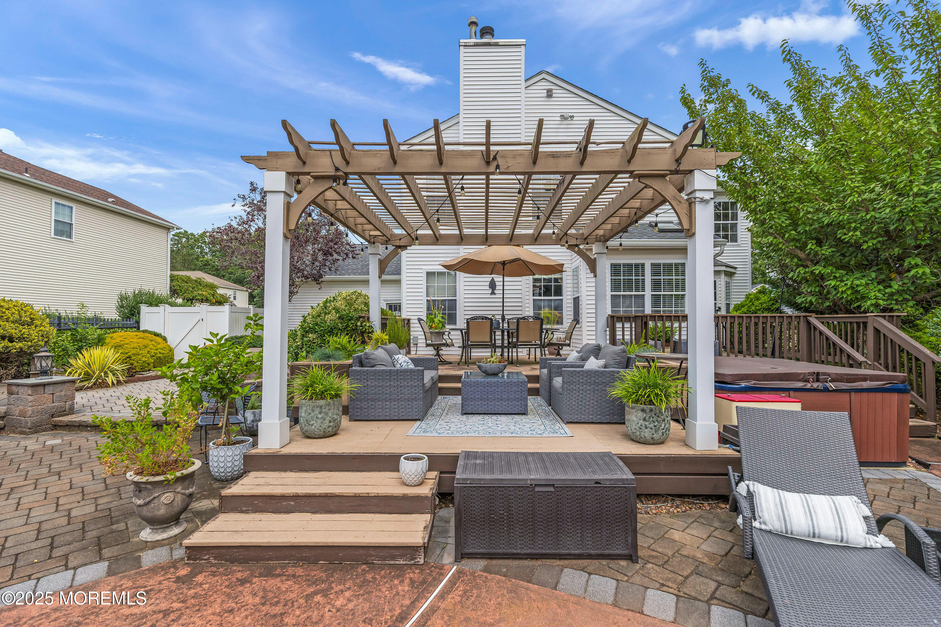 6 Diamond Lane Howell, NJ 07731 - Photo 57 of 78 a view of a patio with couches and potted plants