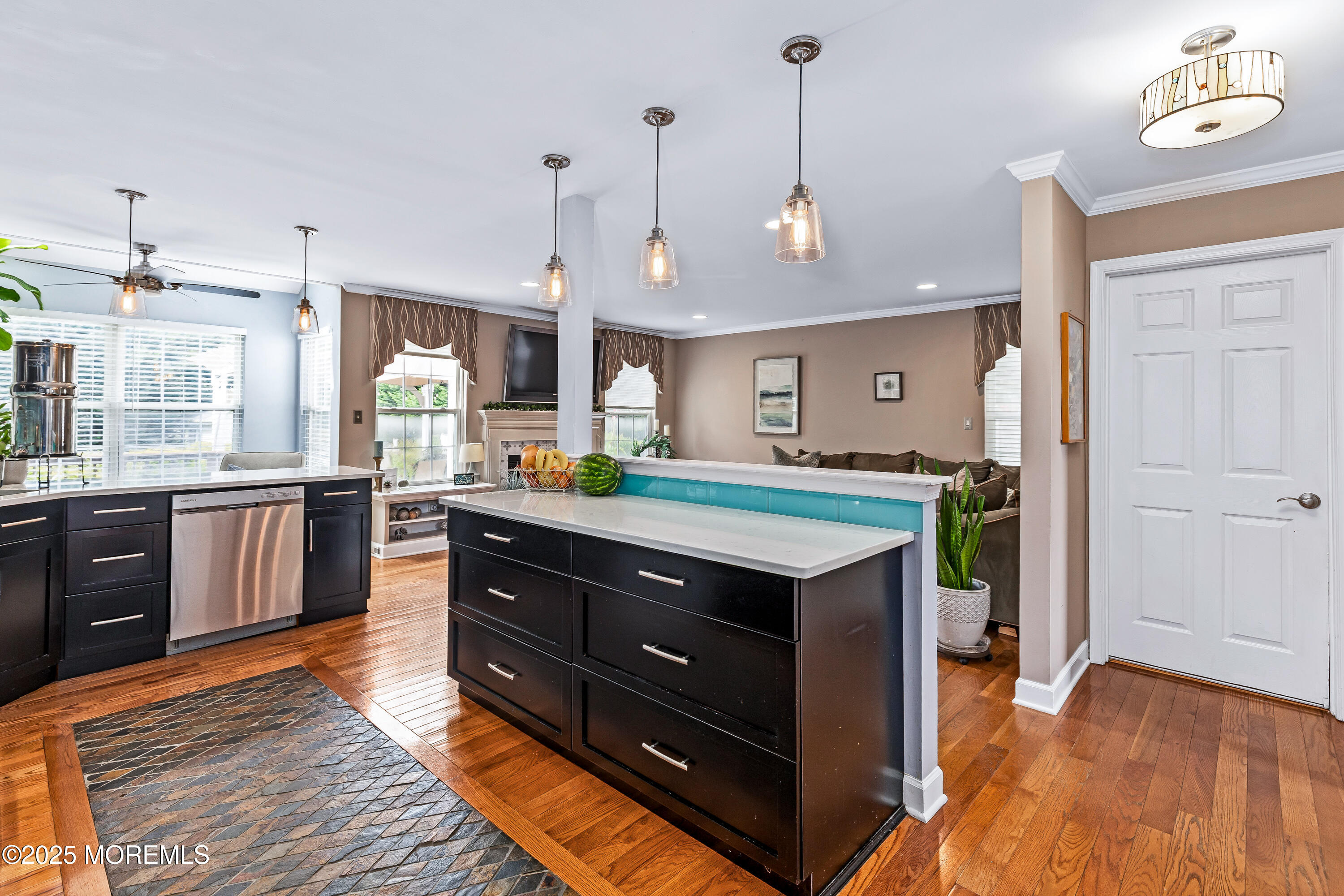 6 Diamond Lane Howell, NJ 07731 - Photo 6 of 78 a kitchen with a sink stove and wooden floor