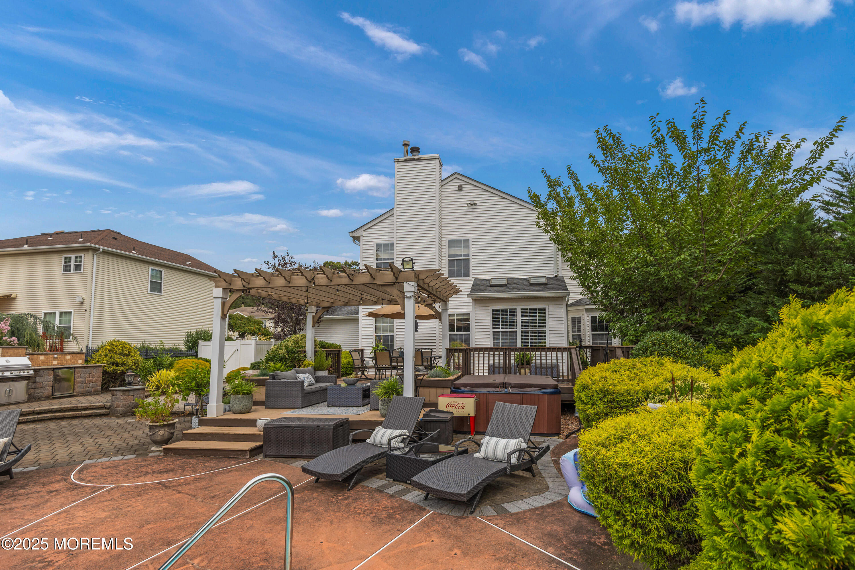 6 Diamond Lane Howell, NJ 07731 - Photo 67 of 78 a view of a patio with couches table and chairs and potted plants