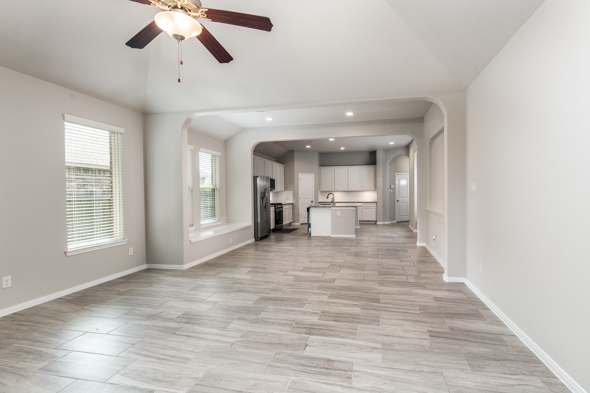 3211 Discovery Lane Conroe, TX 77301 - Photo 7 of 22 Open space from the kitchen to dining to living room