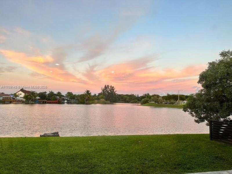 1351 Southwest 124th Court, Unit B5 Miami, FL 33184 - Photo 15 of 37 a view of lake with green field
