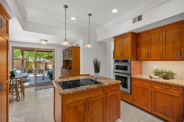 a bedroom with furniture and a wooden floor