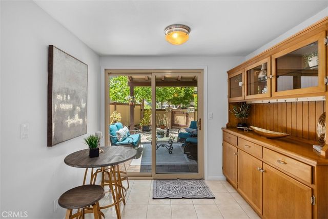 a workspace with furniture and window