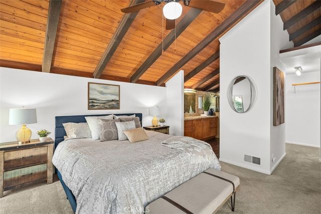 a outdoor space with a table and chairs