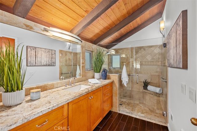 a view of a chair and tables in the patio