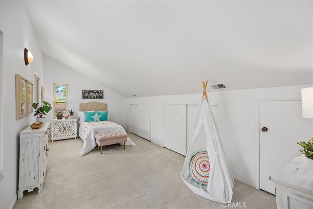 a view of a swimming pool with lounge chair