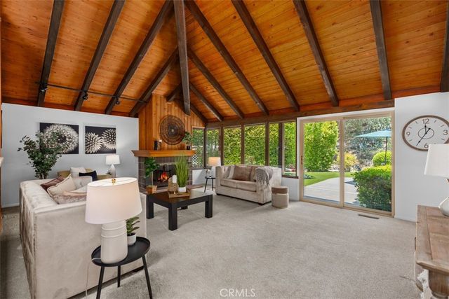 a kitchen with a table and chairs in it