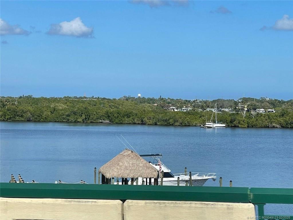 1270 Southeast Parkview Place, Unit B3 Stuart, FL 34994 - Photo 40 of 40 an aerial view of a house with a yard and lake view