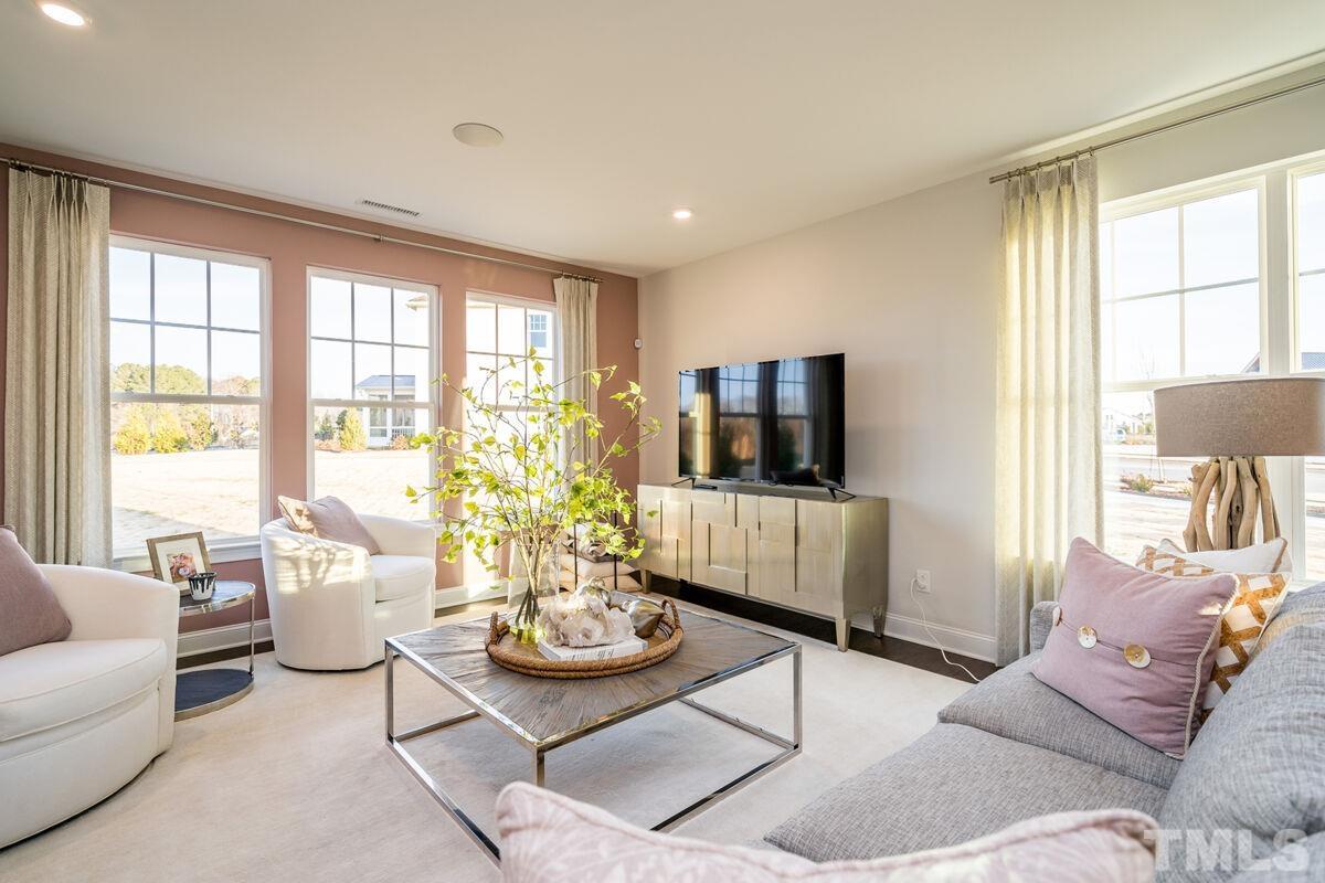 2201 Goudy Drive Raleigh, NC 27615 - Photo 1 of 24 a living room with furniture and a large window