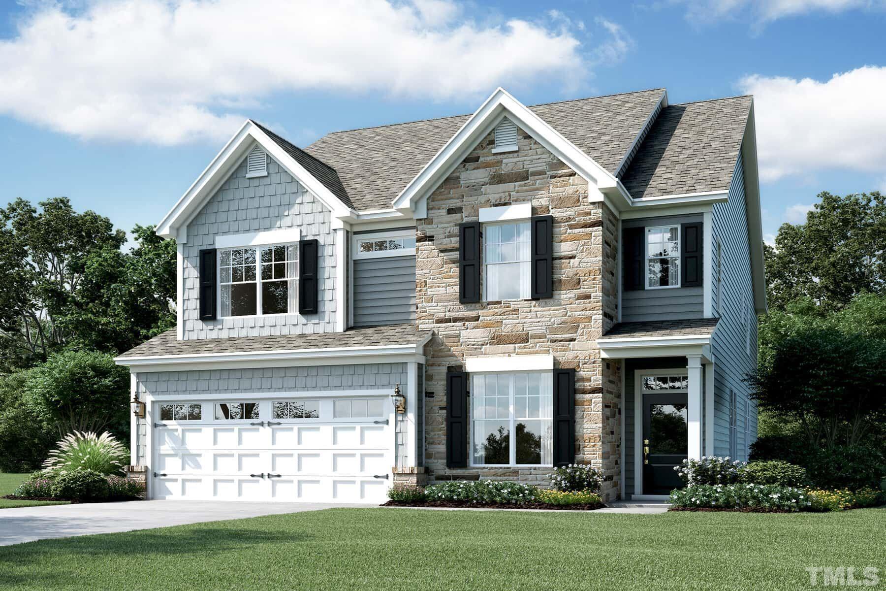 2201 Goudy Drive Raleigh, NC 27615 - Photo 2 of 24 a front view of a house with a yard