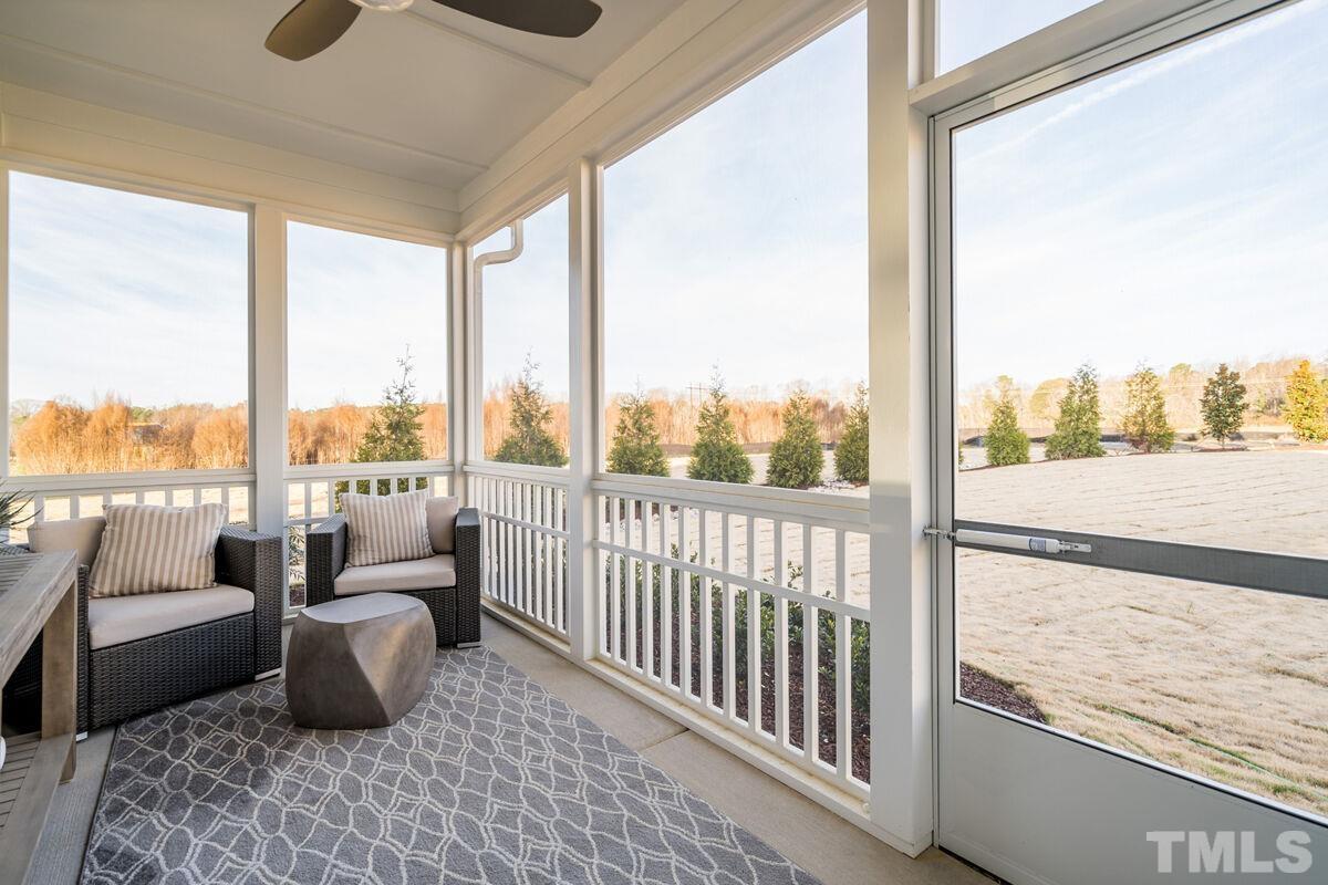 2201 Goudy Drive Raleigh, NC 27615 - Photo 24 of 24 a living room with furniture and floor to ceiling windows